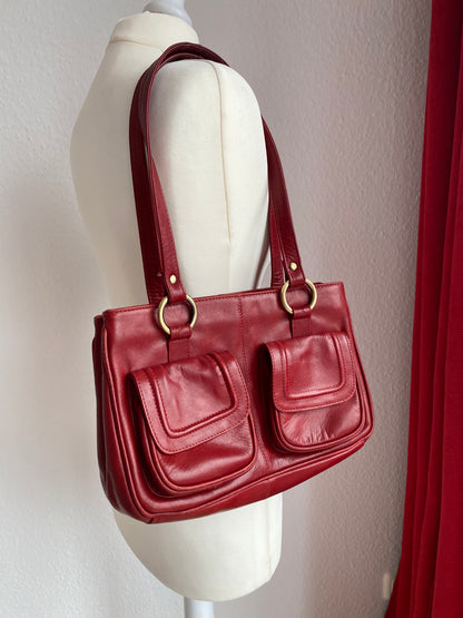 Echtleder Handtasche Lloyd Baker in dunkelrot mit goldenen Ringen, hochwertig