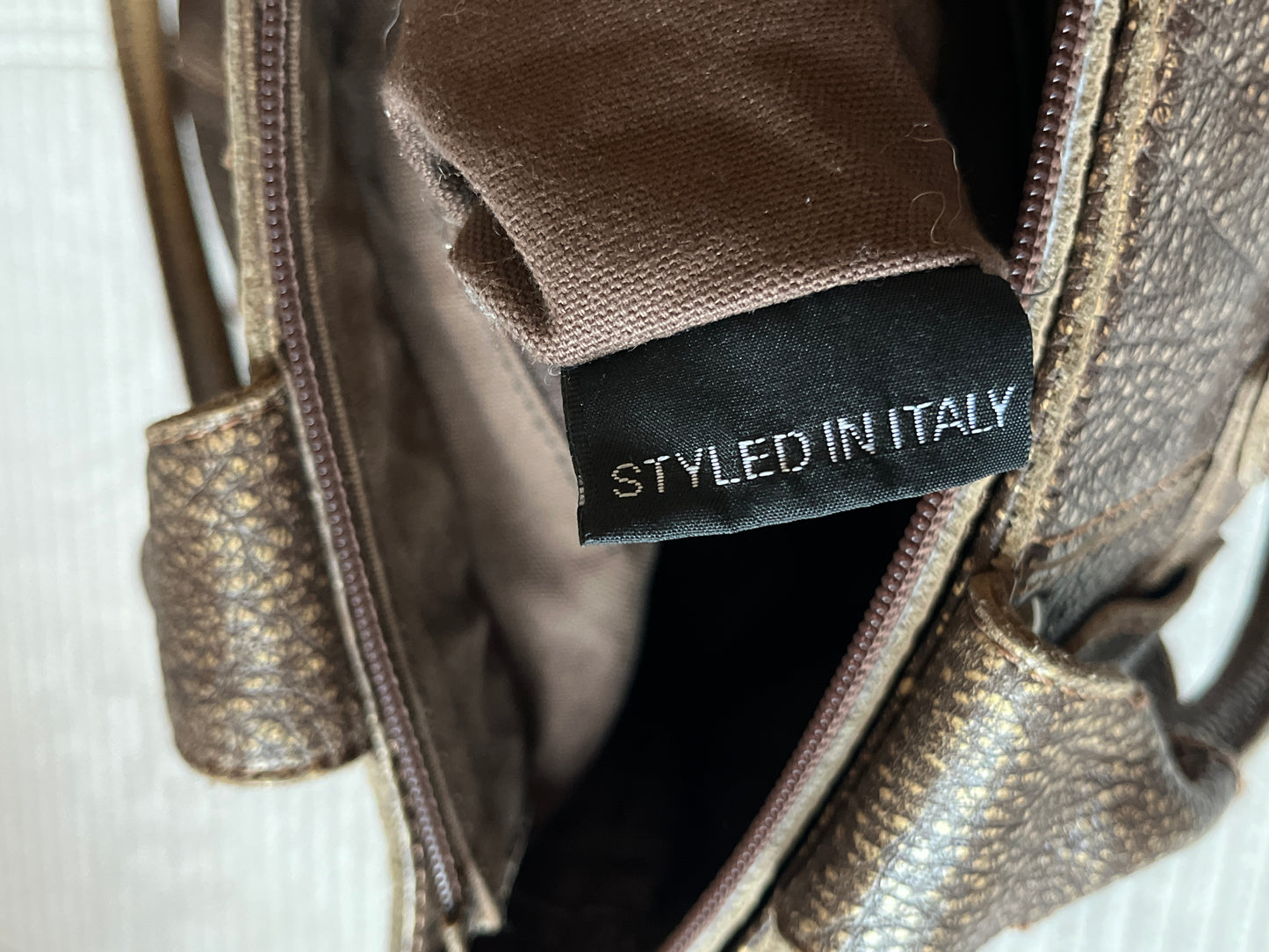 Coccinelle Ledertasche braun gold glänzend Luxus Designer Bag