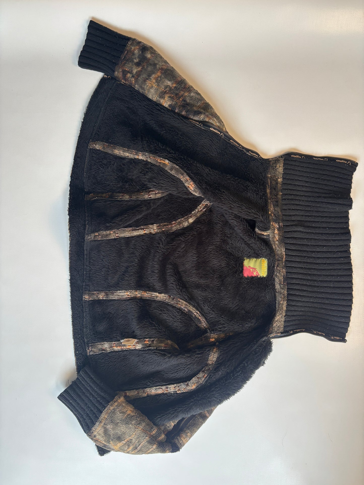 Cheshire asymmetrische Kunstfelljacke in braun schwarz mit Kragen, S